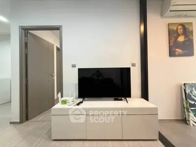 Modern living room with sleek TV stand and minimalist decor