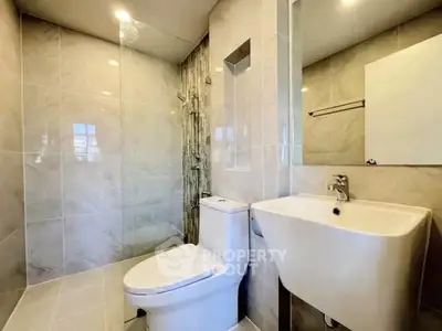 Modern bathroom with sleek fixtures and elegant tile design