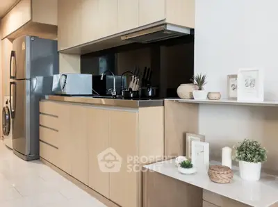 Modern kitchen with sleek cabinetry and stainless steel appliances