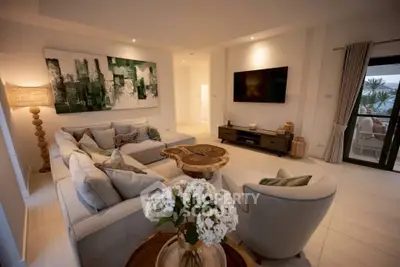 Luxurious living room with modern decor and large sectional sofa
