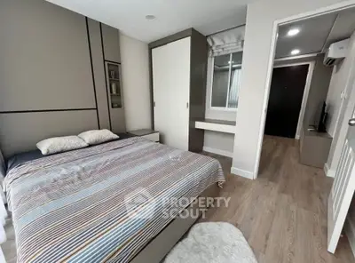 Modern bedroom with stylish decor and cozy ambiance