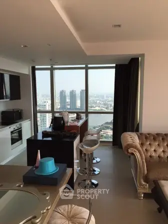 Luxurious high-rise apartment with stunning city view and elegant interior design.