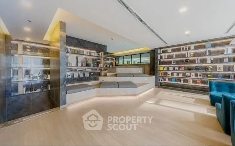 Modern library with sleek design and ample natural light, featuring stylish seating and extensive book collection.