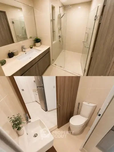 Modern bathroom with glass shower and sleek fixtures in a contemporary apartment.