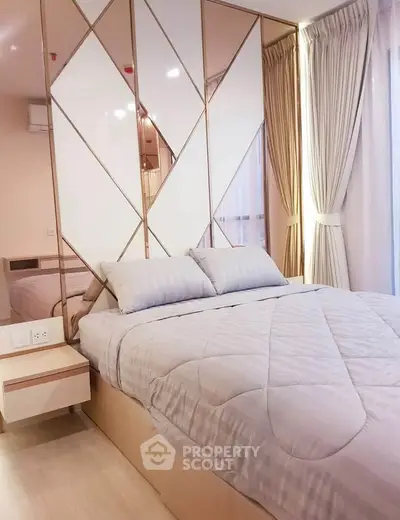 Modern bedroom with stylish decor and natural light