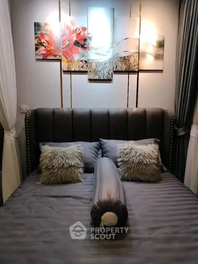 Luxurious bedroom with elegant decor and plush bedding