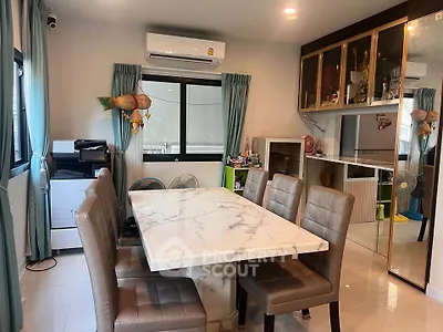 Modern dining room with marble table and elegant decor