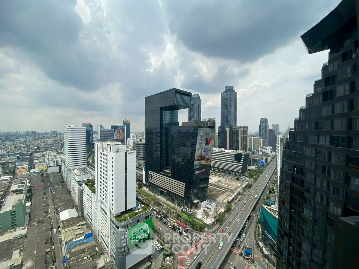 Stunning cityscape view showcasing modern skyscrapers and bustling urban life.