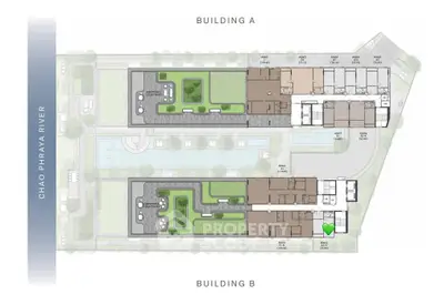 Floor plan of modern residential complex with two buildings and river view.