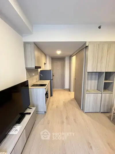 Modern apartment interior with sleek kitchen and open layout