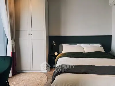 Cozy bedroom with modern decor and natural light