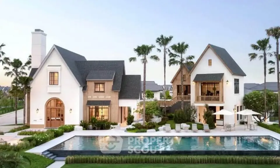 Luxurious modern villa with pool and palm trees, perfect for upscale living.