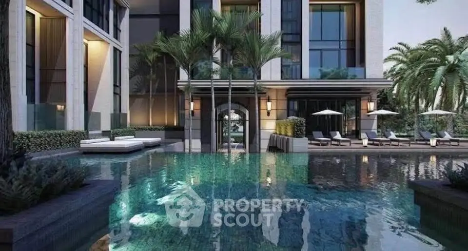 Luxurious residential building with stunning pool and palm trees, perfect for relaxation and leisure.