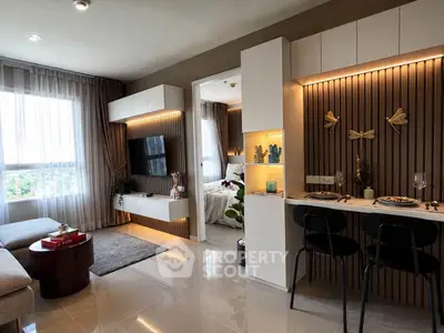 Modern open-plan living room with stylish decor and natural light