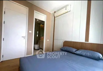 Modern bedroom with air conditioning and ensuite bathroom