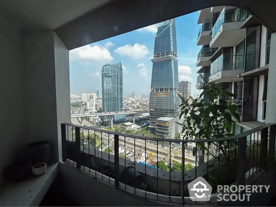 Stunning cityscape view from modern balcony with lush greenery