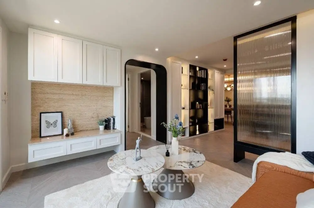 Luxurious modern living room with elegant decor and stylish furniture, perfect for sophisticated urban living.