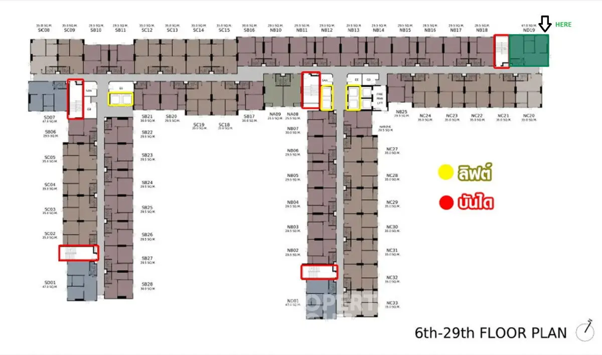 Detailed floor plan of a multi-story building with highlighted areas for elevators and emergency exits.