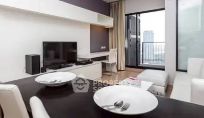 Modern living room with city view and sleek furniture