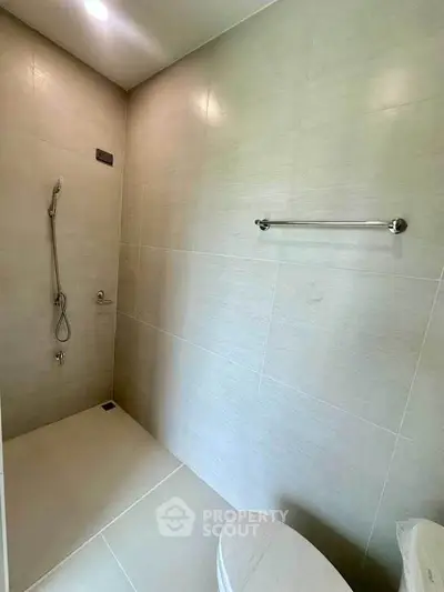 Modern bathroom with sleek shower and minimalist design