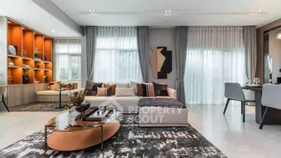 Luxurious modern living room with stylish decor and ample natural light
