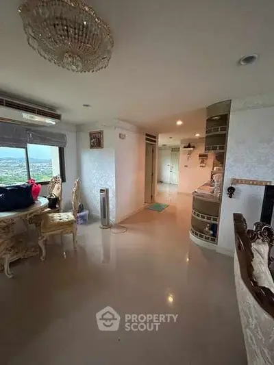 Spacious living room with elegant decor and stunning view