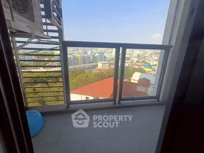 Charming balcony with city view, perfect for relaxation and enjoying the skyline.