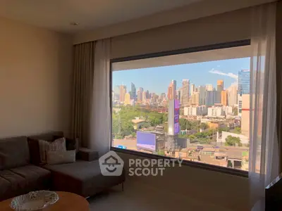 Spacious living room with stunning city view through large window