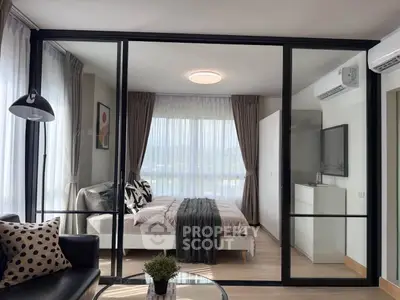 Modern bedroom with glass partition and stylish decor in a bright apartment
