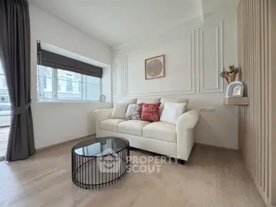 Stylish living room with modern decor and cozy white sofa