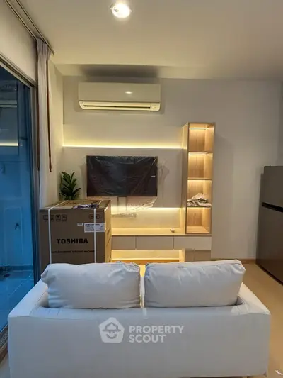 Modern living room with air conditioning and sleek shelving unit