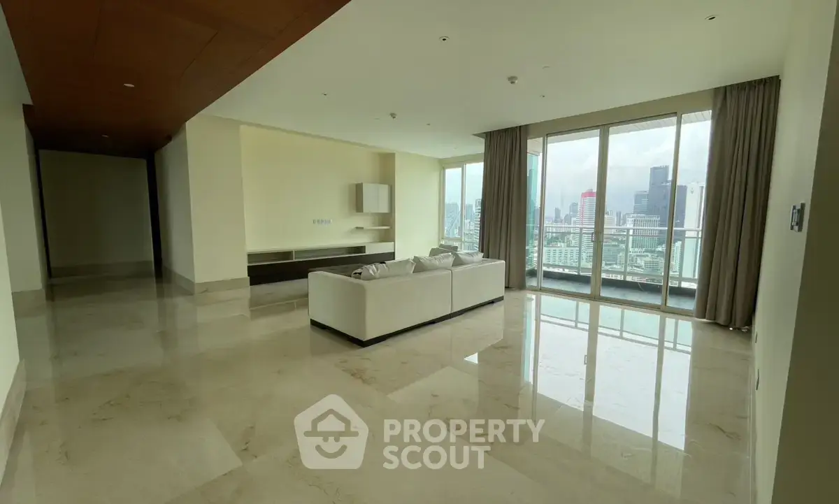 Spacious modern living room with city view and elegant marble flooring