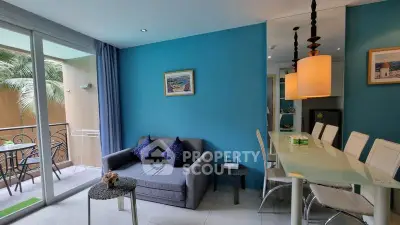 Chic living room with modern decor and balcony access in vibrant apartment