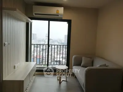 Modern living room with city view and cozy furniture
