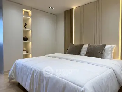 Luxurious modern bedroom with elegant decor and ambient lighting