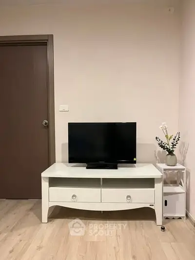 Modern living room with sleek TV stand and minimalist decor