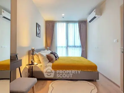 Modern bedroom with stylish decor and natural light