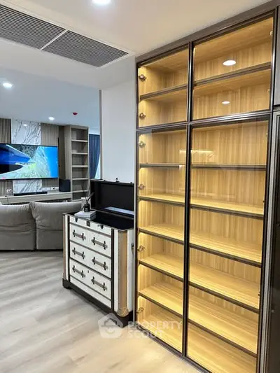 Modern living room with stylish shelving and elegant decor