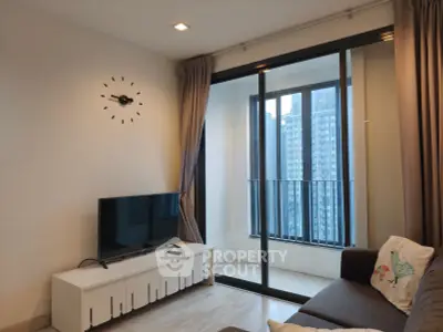 Modern living room with balcony view in high-rise apartment