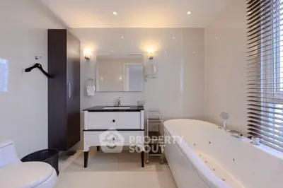 Luxurious bathroom with modern fixtures and elegant bathtub