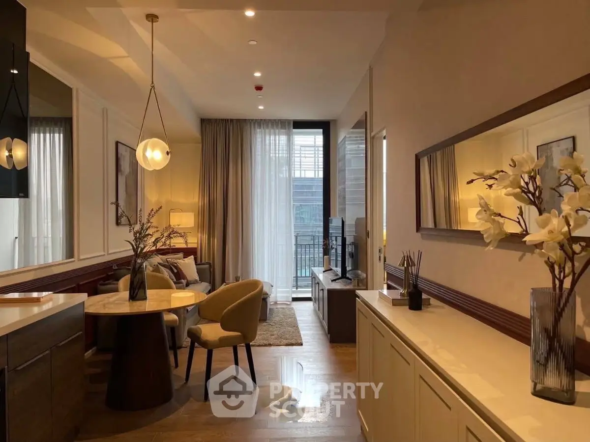 Luxurious living room with elegant decor and large windows offering natural light.