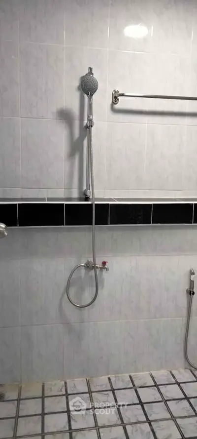 Modern bathroom with sleek shower design and tiled walls