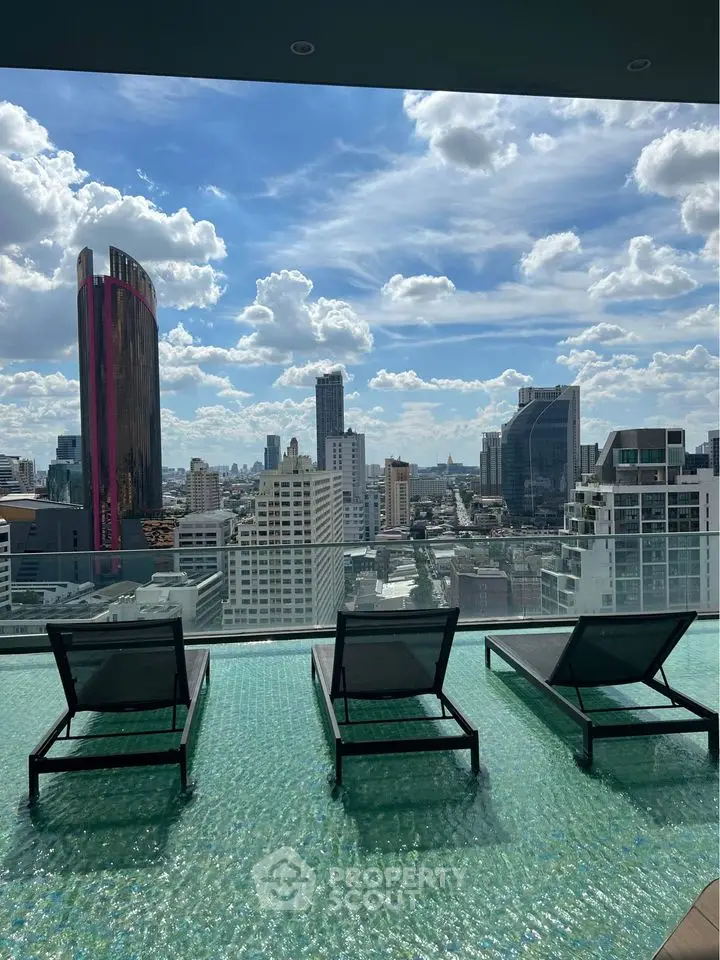 Luxurious rooftop pool with stunning city skyline view