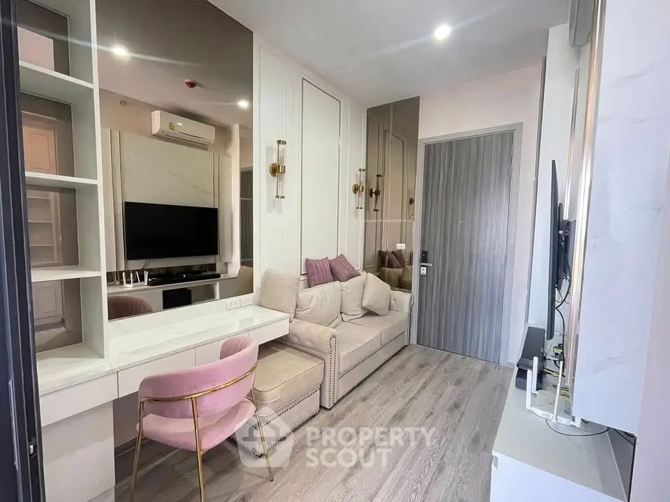 Modern living room with stylish decor and mirrored wall accents