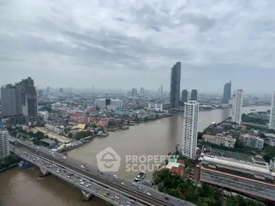 Stunning cityscape view with river and skyscrapers, ideal for urban living enthusiasts.