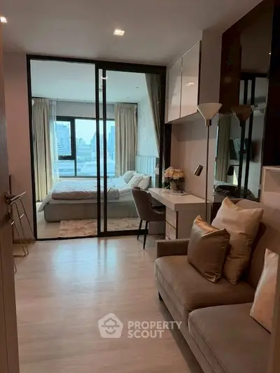 Modern apartment interior with cozy living room and stylish bedroom view.