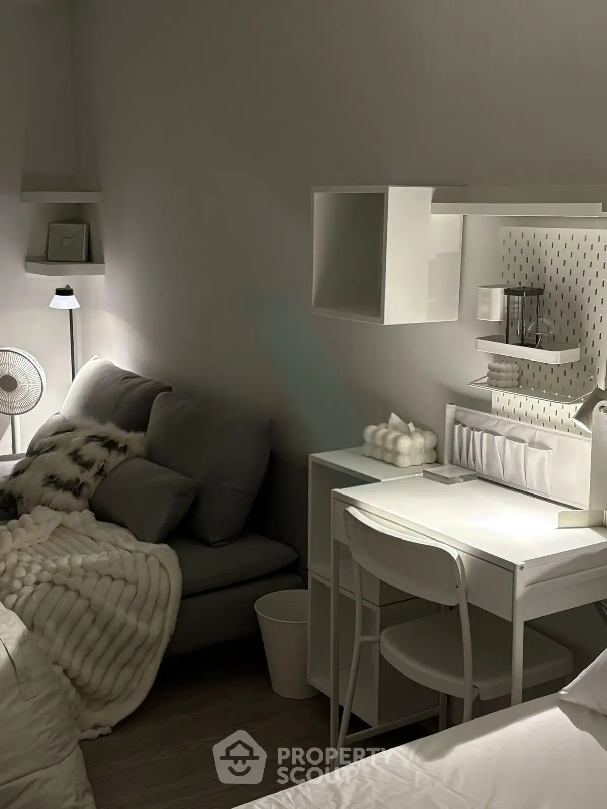 Cozy modern living room with stylish decor and comfortable seating, perfect for relaxation and productivity.