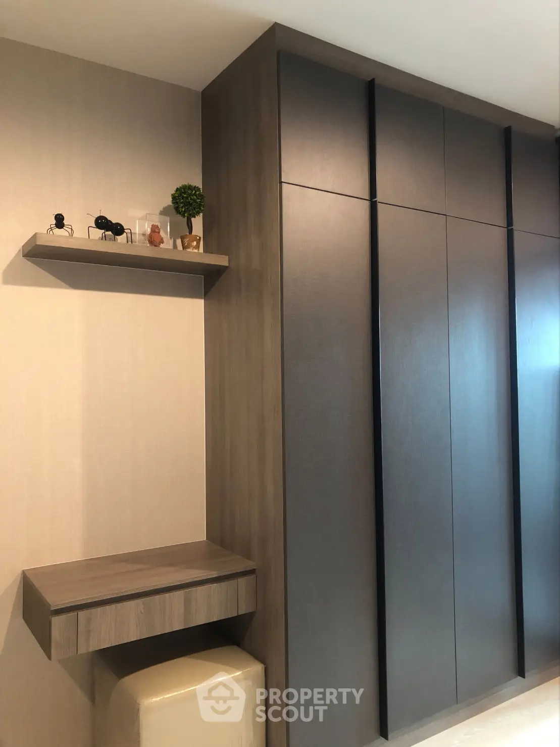 Modern bathroom with sleek wooden shelves and stylish decor