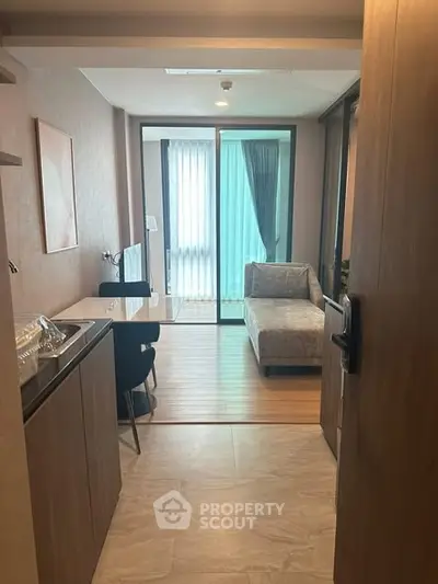 Modern apartment interior with cozy living area and stylish furniture