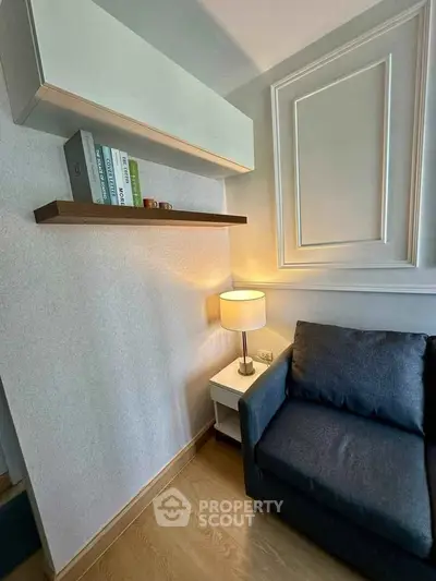 Cozy living room corner with modern decor and stylish shelving